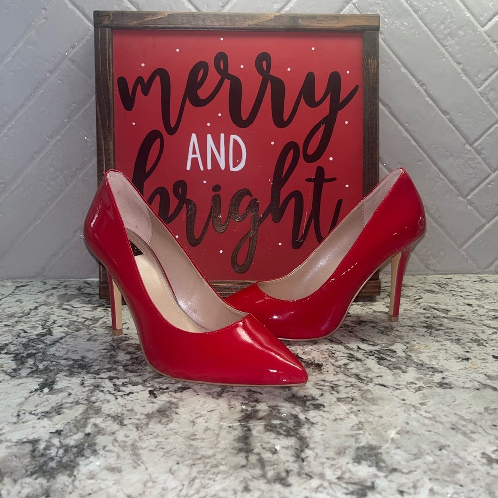 White House Black Market red heels, size 7.